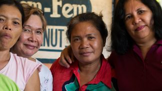 Perla Almaden and the workers at her peanut factory