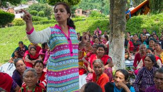 Yelisha Sharma, Communications Director for Tewa, speaks to women who are earthquake survivors in Nepal