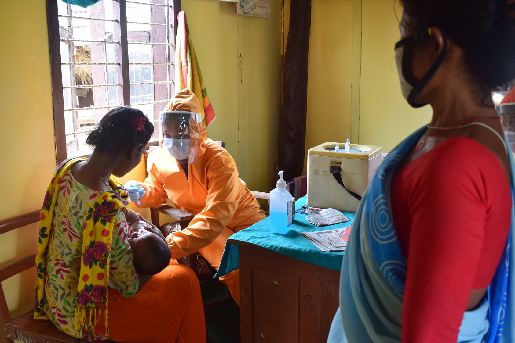Children receive immunization services through Community clinic worec udayapur when services were shutdown throughout the district