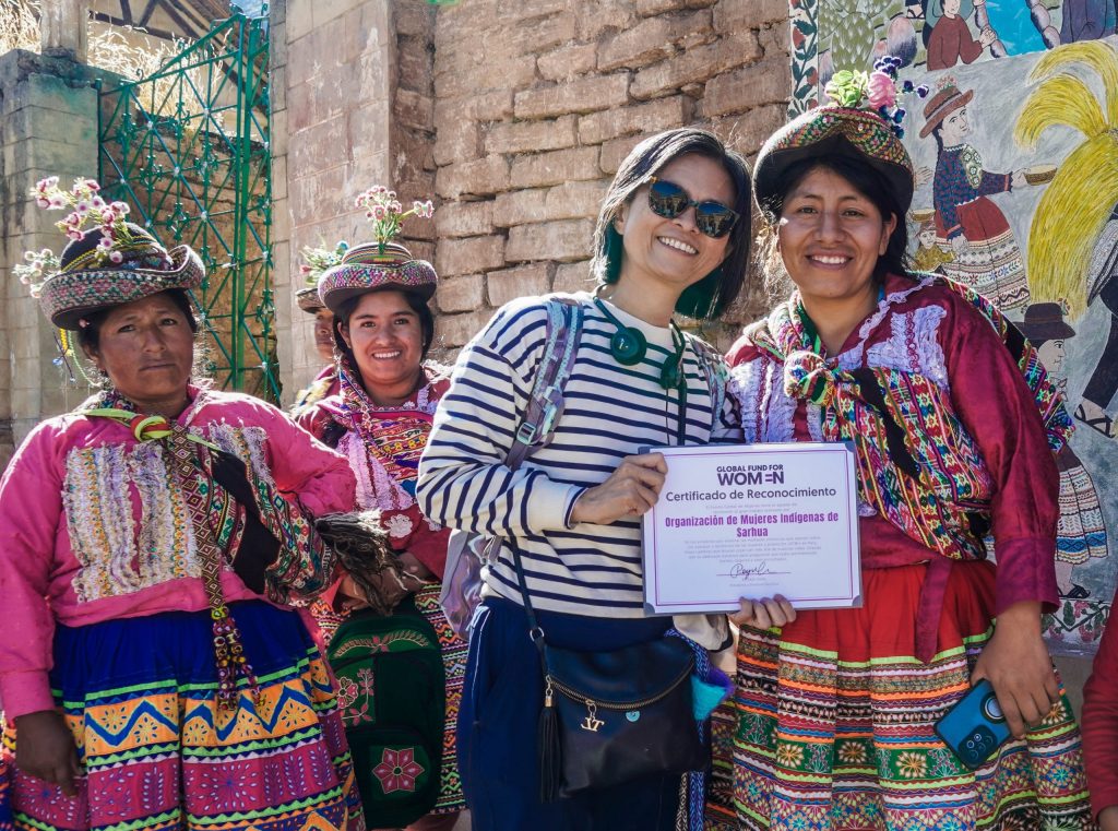 PeiYao Chen, President and CEO of Global Fund for Women, and grantee partners in Peru